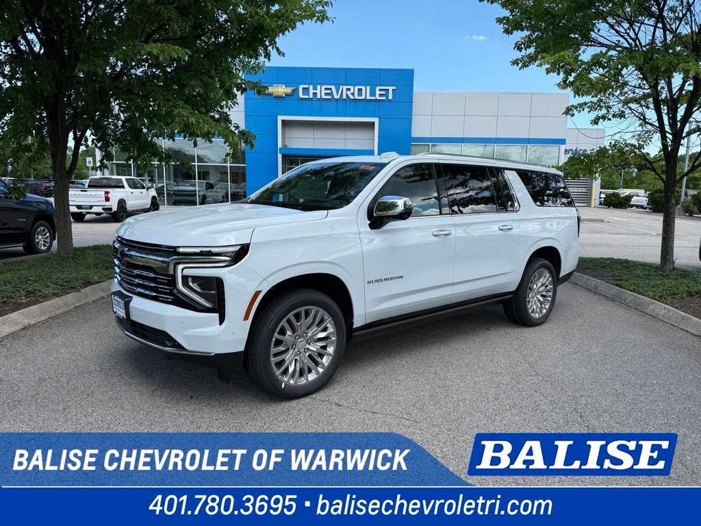 2026 Chevrolet Suburban Premier in Polar White Tricoat — front three-quarter view