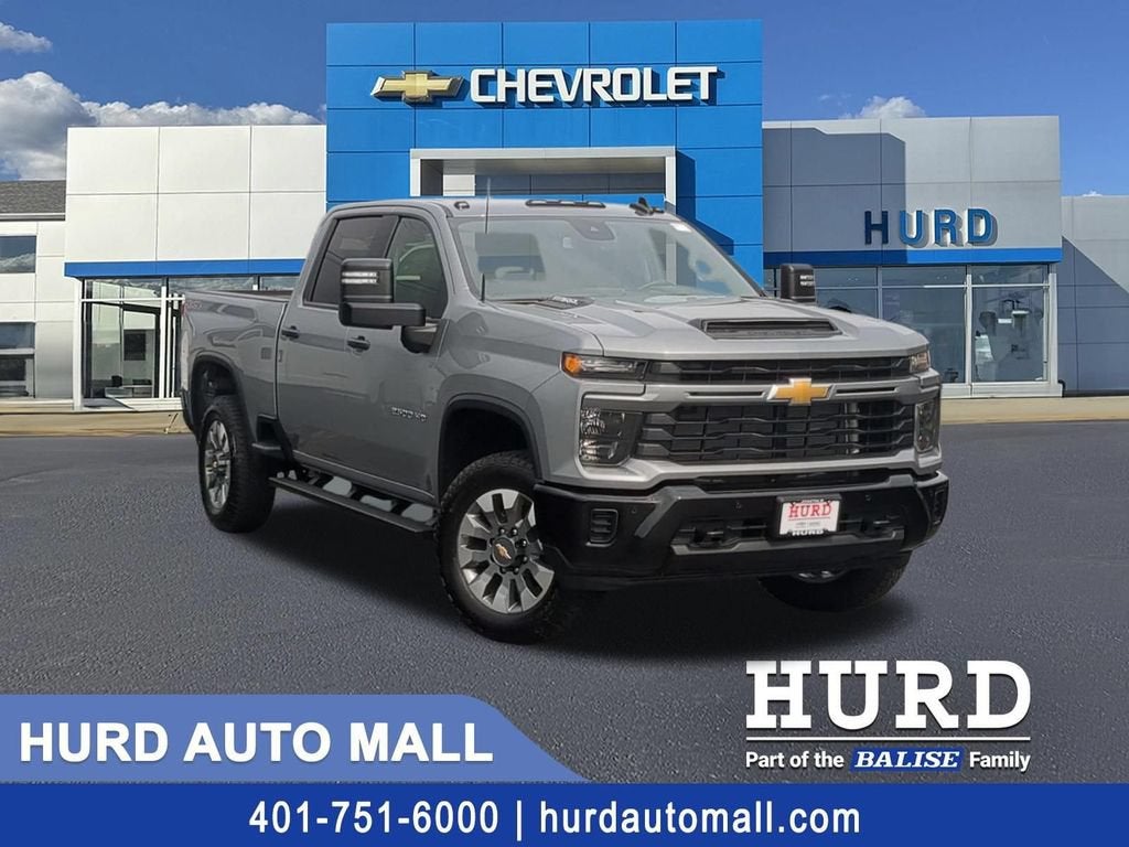 2026 Chevrolet Silverado 2500 HD Custom in Sterling Gray Metallic — front three-quarter view