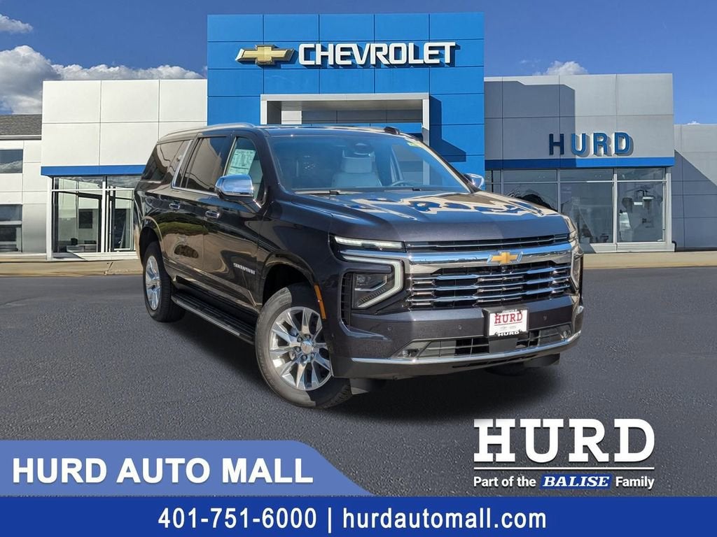 2026 Chevrolet Suburban Premier in Dark Ash Metallic — front three-quarter view