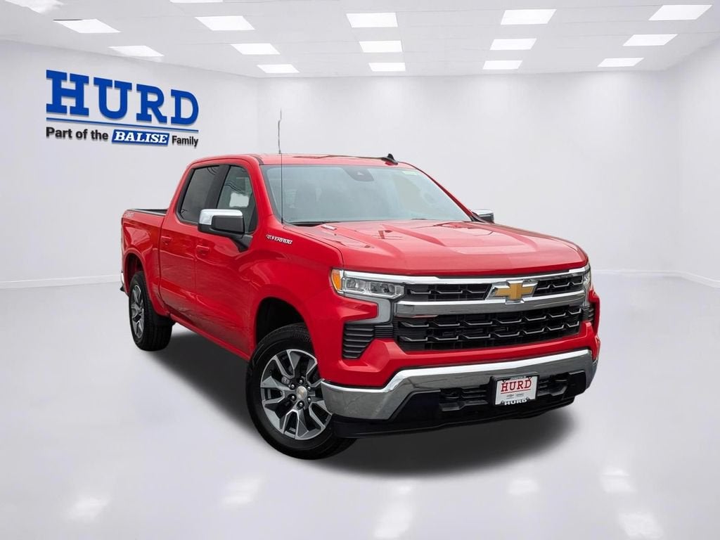 2025 Chevrolet Silverado 1500 LT (2FL) in Red Hot — front three-quarter view