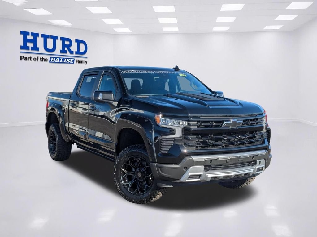 2026 Chevrolet Silverado 1500 RST in Black — front three-quarter view